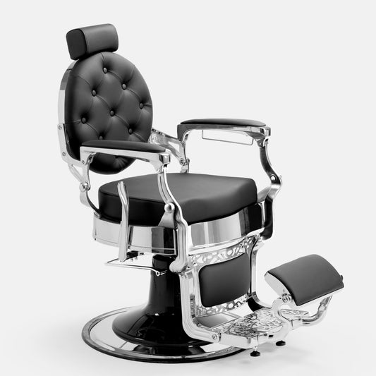 Cadeira de barbeiro MAE com base cromada e estofo preto de alta resistência.
