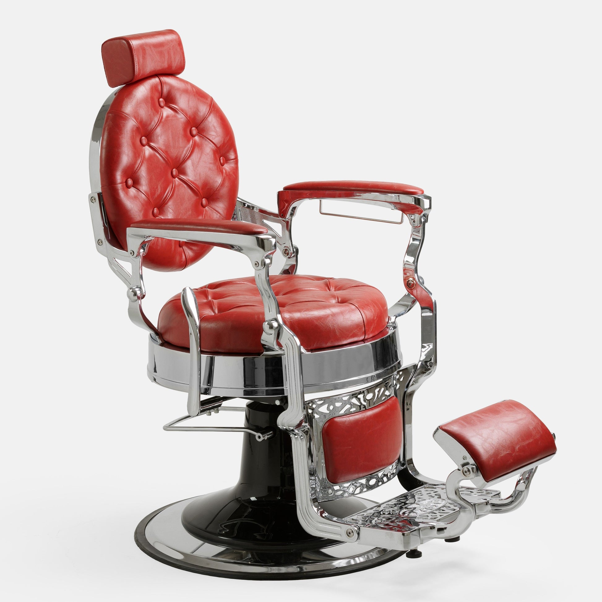 Cadeira de barbeiro MACK Pro Salon em cromada com detalhes a vermelho.
