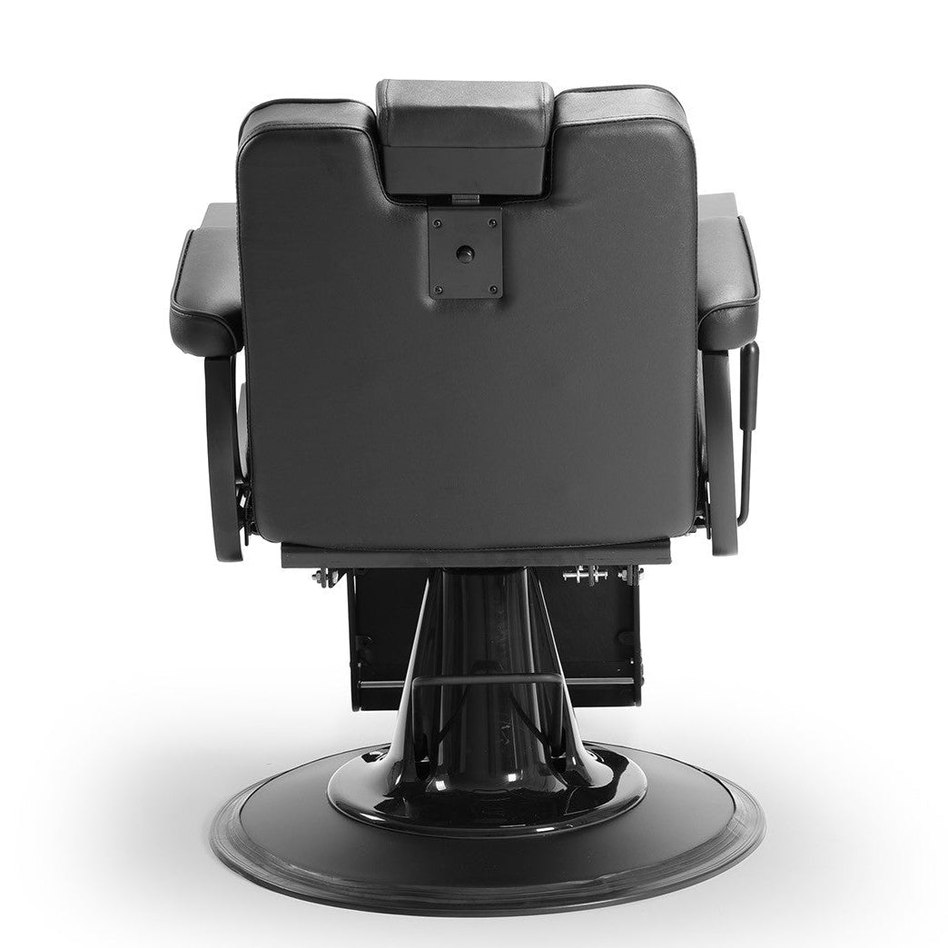 Cadeira de barbeiro profissional modelo GONI com base hidráulica e design ergonómico.